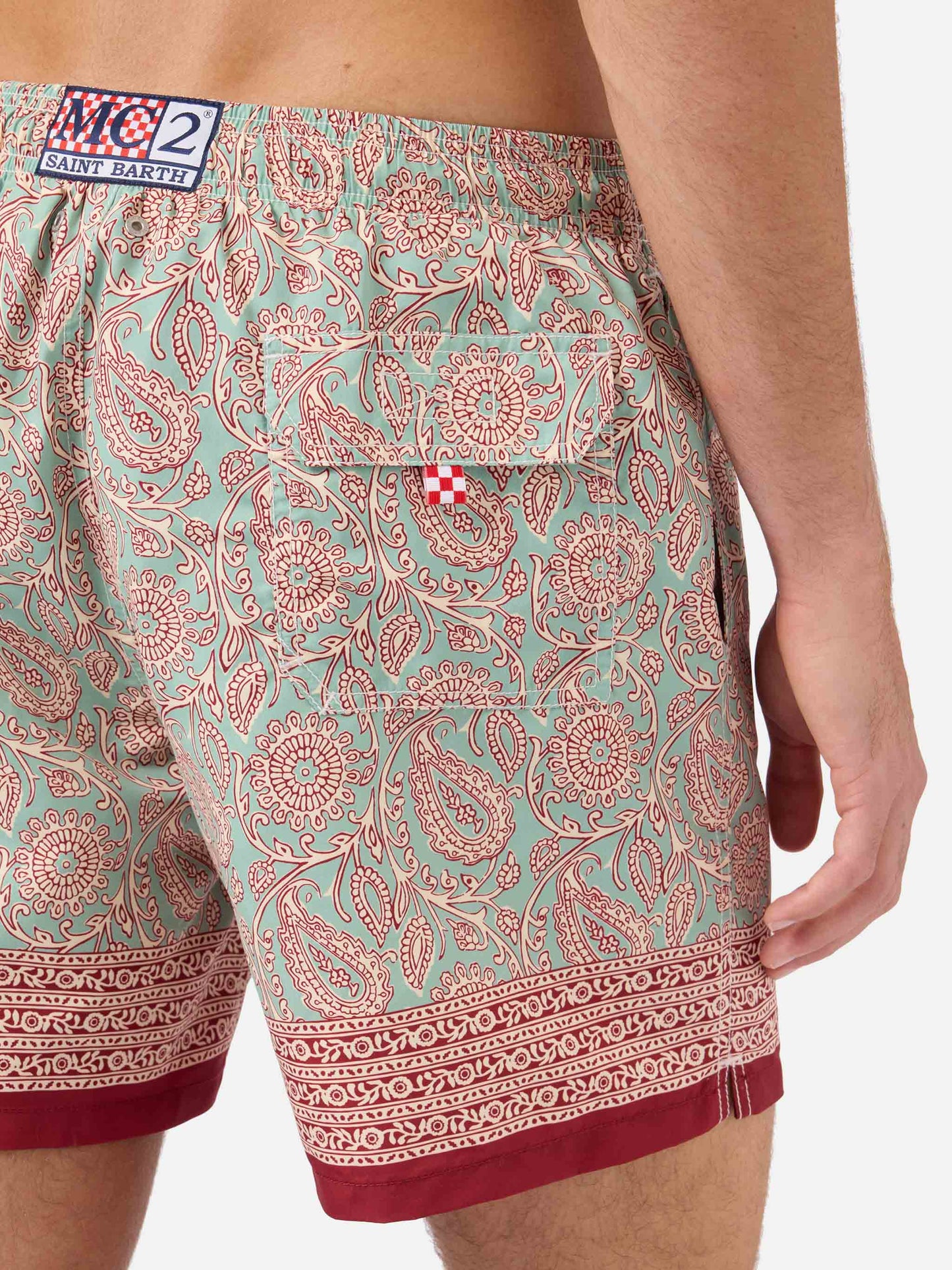 Gustavia aqua green swim shorts with contrasting paisley print