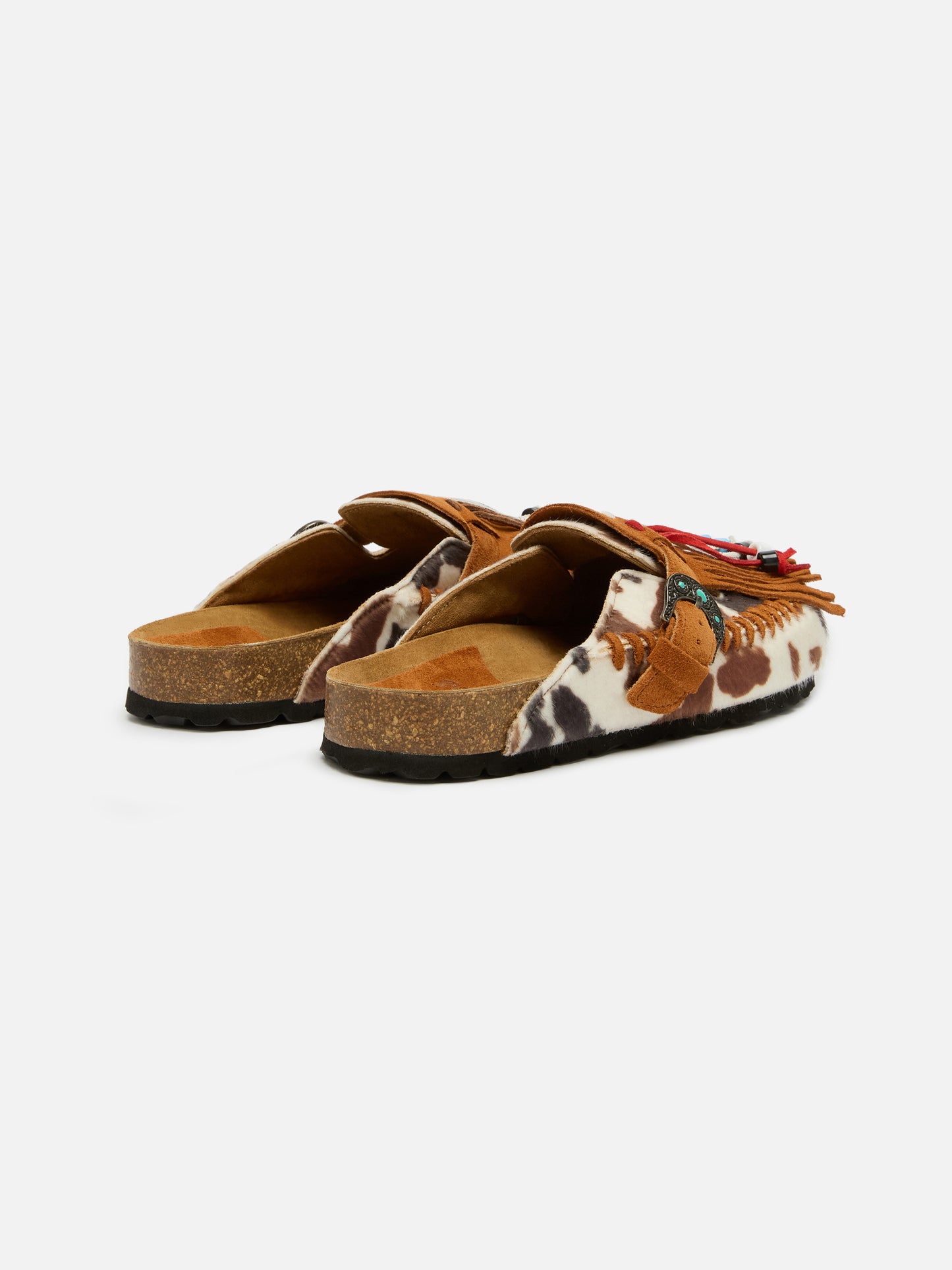Caribe Sandalen mit Kuhfellmuster und Pferdeschwanz | TAJI SPECIAL EDITION