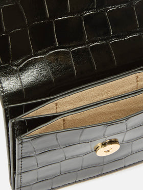 Tarjetero de piel negra con estampado croco 