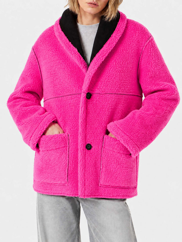 Black and fluo pink Dorys reversible shearling coat