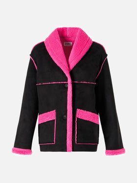 Cappotto Dorys in shearling reversibile nero e fucsia fluo