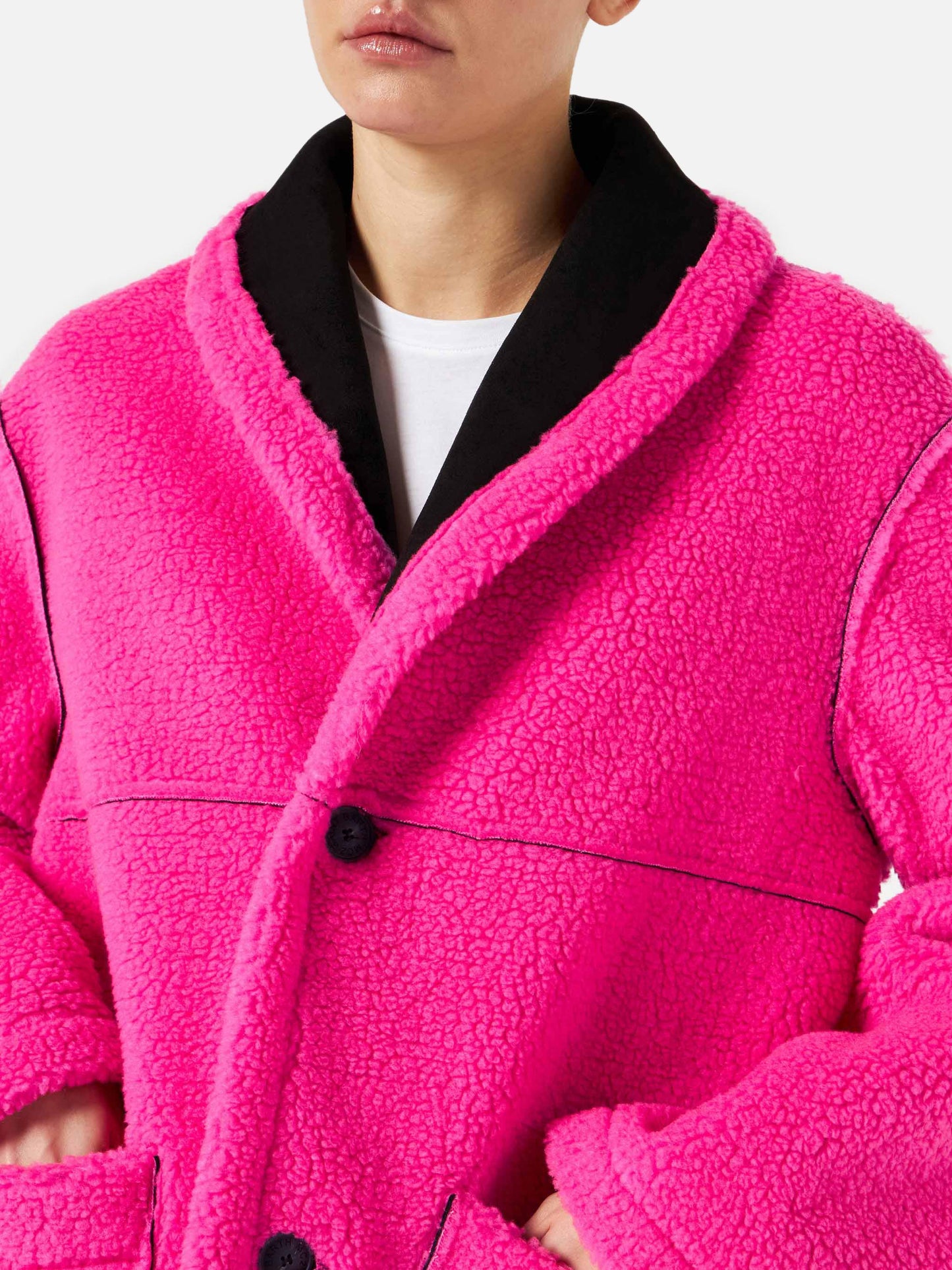 Cappotto Dorys in shearling reversibile nero e fucsia fluo