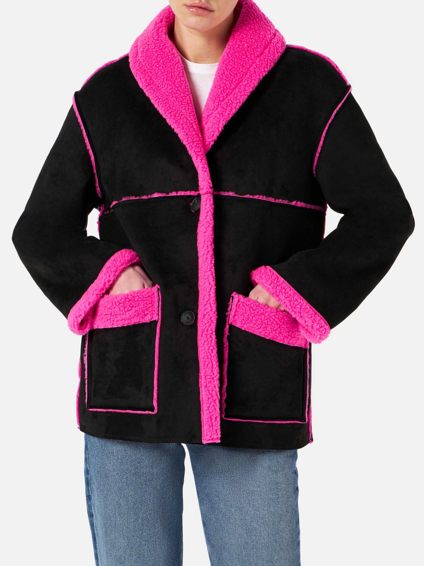 Cappotto Dorys in shearling reversibile nero e fucsia fluo