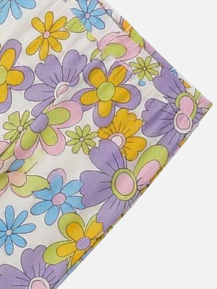 Flared pants Gwenda Jr with hippie flower print