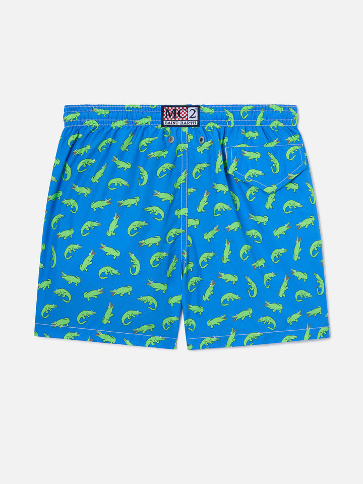 Jungen-Badeshorts in Bluette mit grünem Alligator-Print 