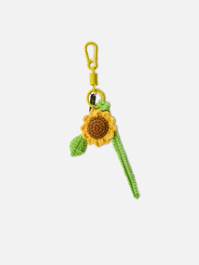 Lustiger Taschenanhänger mit gehäkelter Sonnenblume