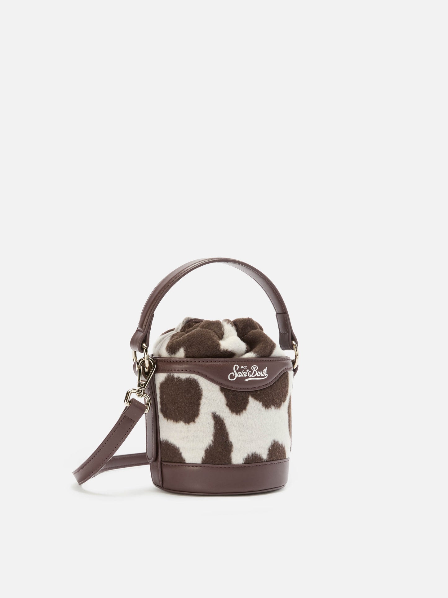 Mila Tweed Bucket Bag aus Tweed-Wollmischung mit Kuhfellmuster.
