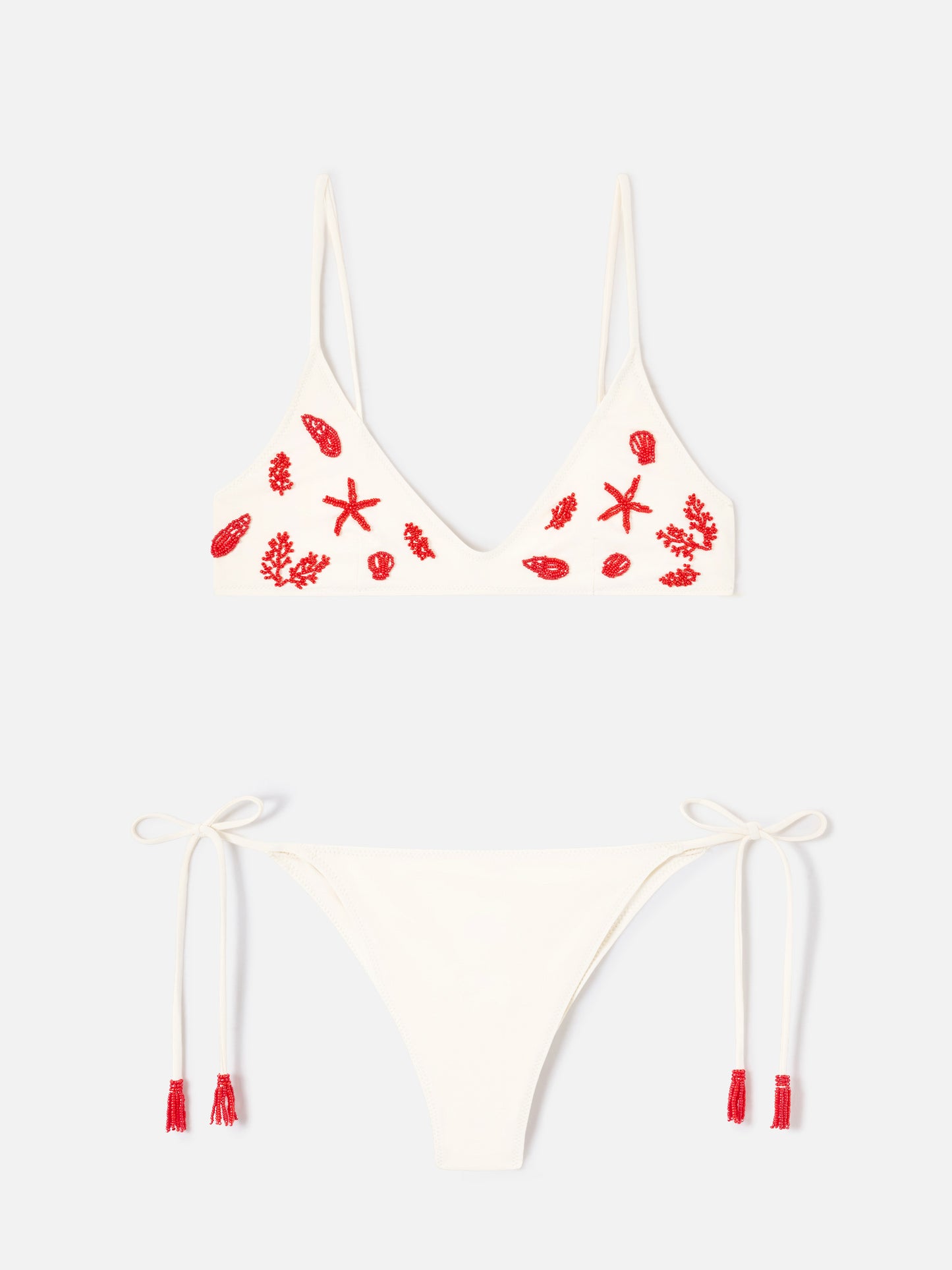 Bikini color crema Paloma Marielle con cuentas y borlas 