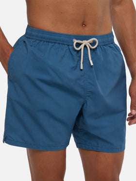 Patmos swim shorts in navy blue with used effect and logo embroidery