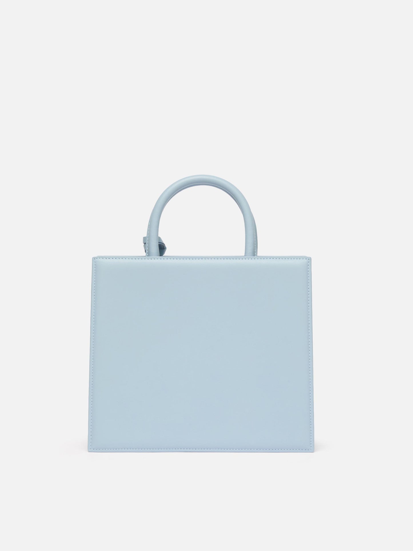 Bolso Structured Shop Midi en piel lisa azul claro con placa metálica 
