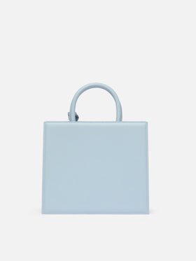 Bolso Structured Shop Midi en piel lisa azul claro con placa metálica 