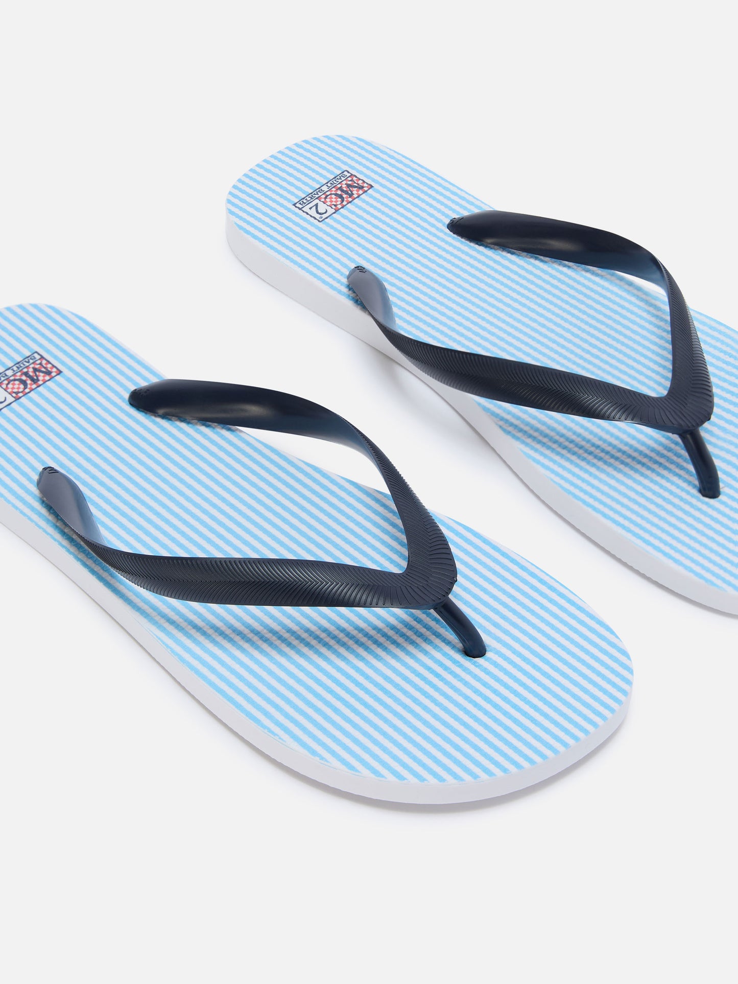 Chanclas slip-on de goma Tommy con rayas azul claro 